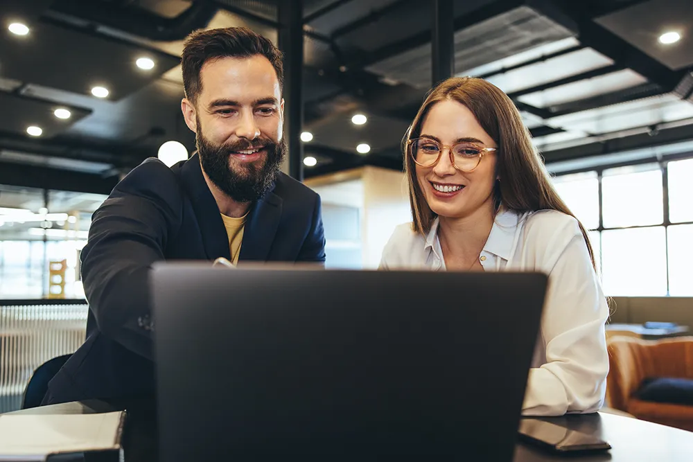 office workers checking alternative sourcing options