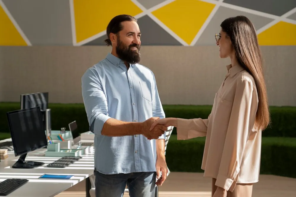 a man and woman shaking hands